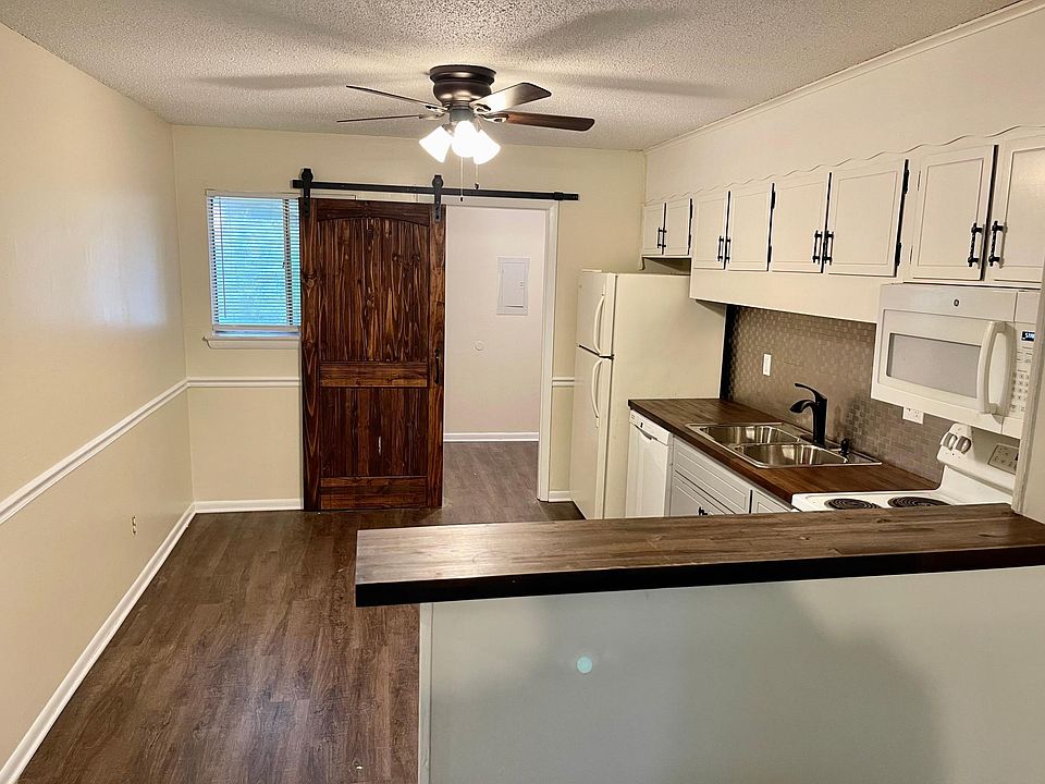 Brand new floors! Brand new ceiling fans! Brand new countertops! Fresh paint too to bottom!