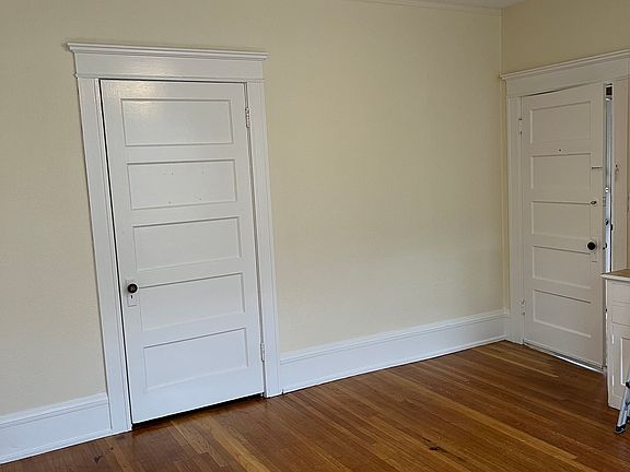 Front room next to room furnace closet and front door