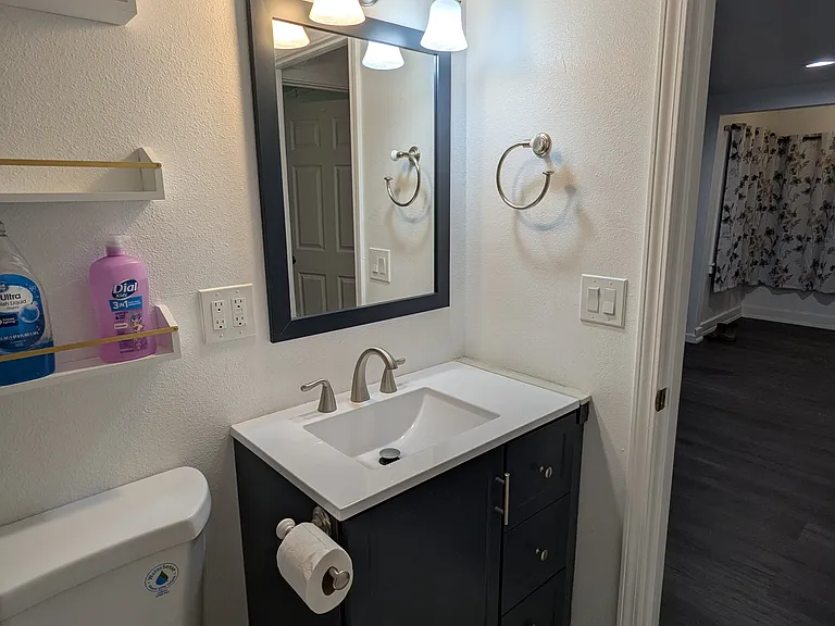 Brand new vanity, storage shelves and drawers in vanity. Making the most of the bathroom spaces.