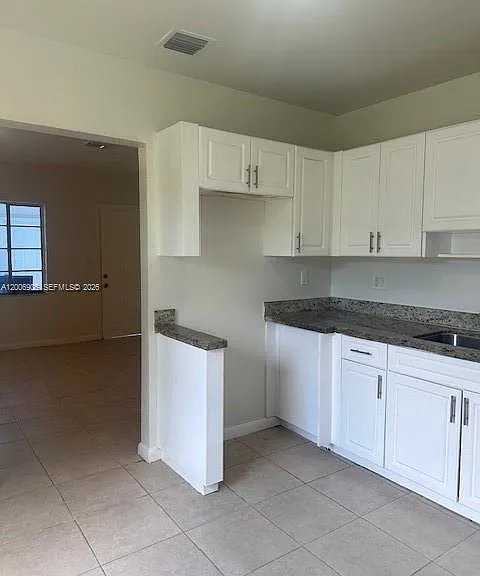 1884 NW 52nd St — Photo 12