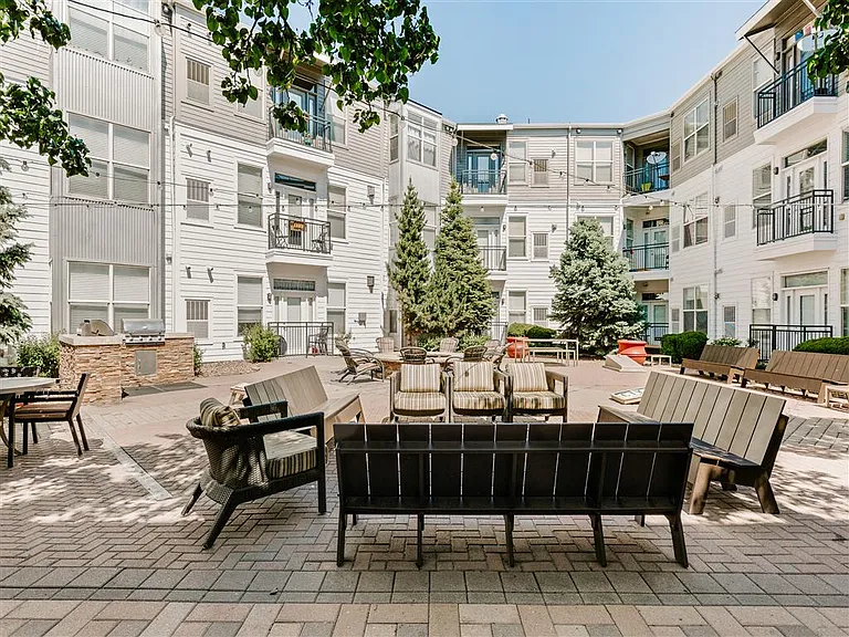 Cozy courtyard lounge with firepit and grills