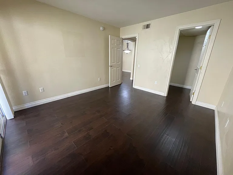 Bedroom with walk-in closet