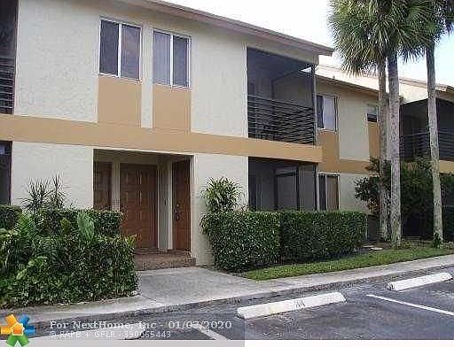 1st image of 704 Gardens Dr APT 203