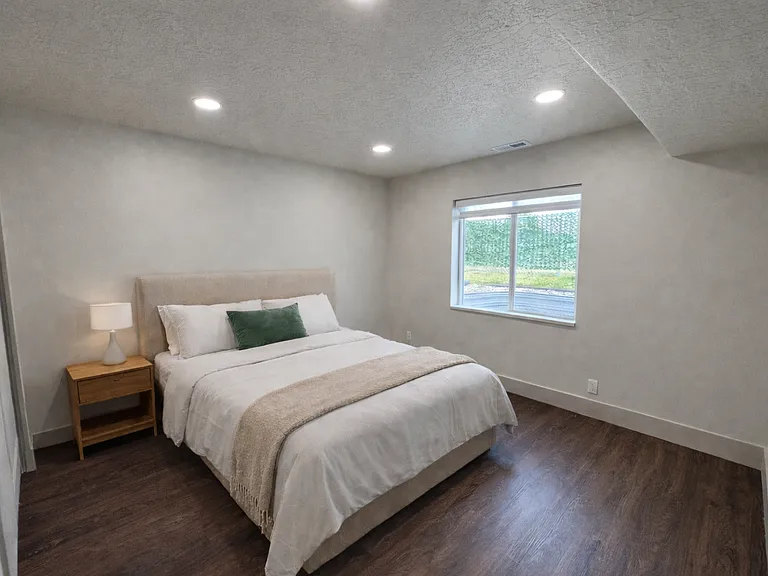 Comfortable third bedroom ideal for guests, kids, or a home office.