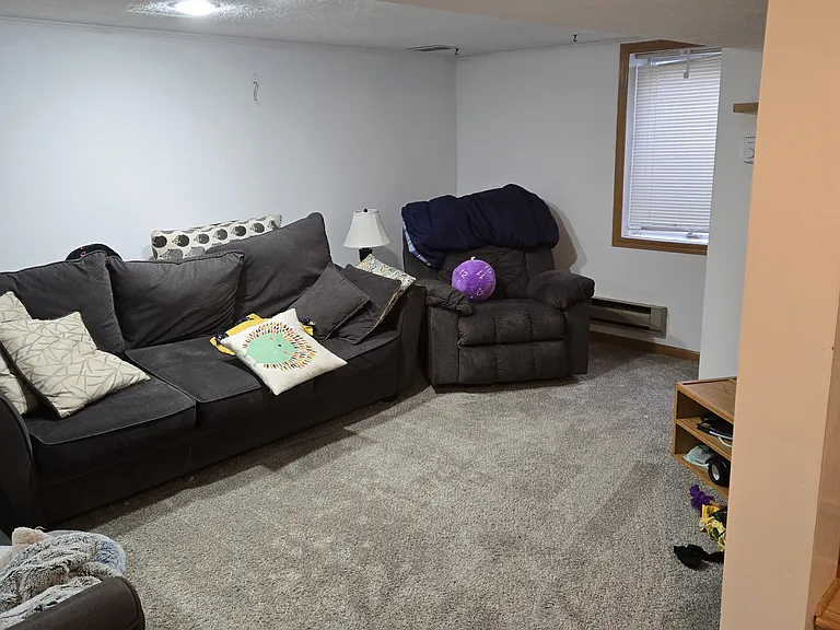 one side of downstairs entertainment space