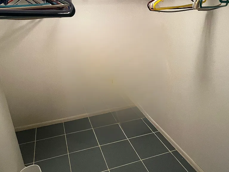 primary closet is empty, unlike photo.