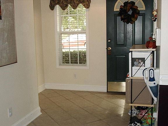 Oversized Tile Foyer With Coat Closet*Great Houseplant Location