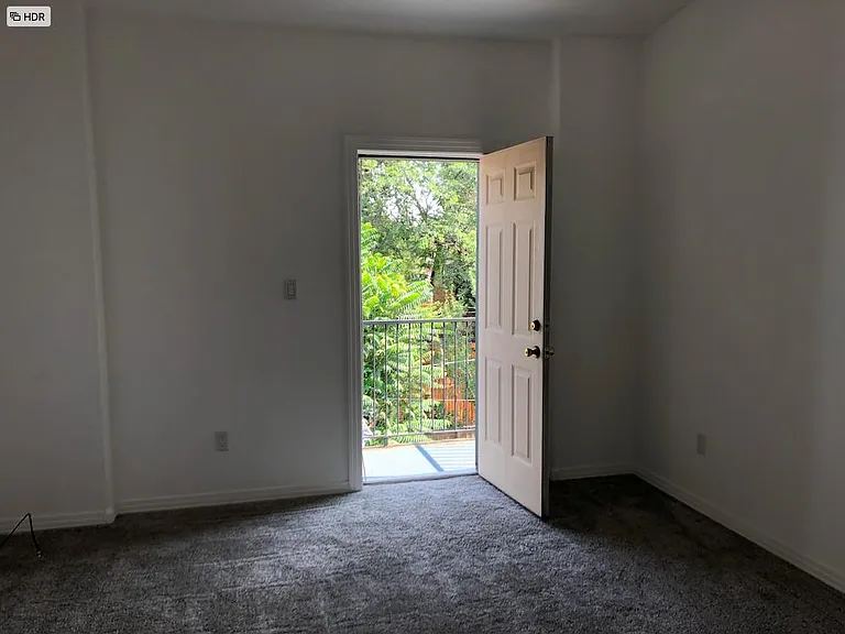 Bedroom area with private balcony.