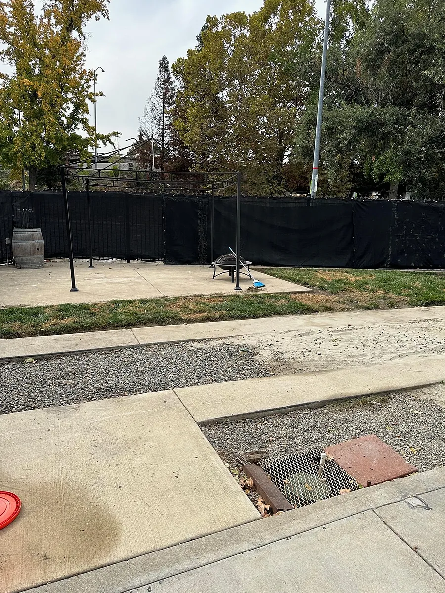 Backyard / Patio area where you're free to BBQ or even set up a fire pit and patio furniture, great for entertaining guests. - 2214 4th St