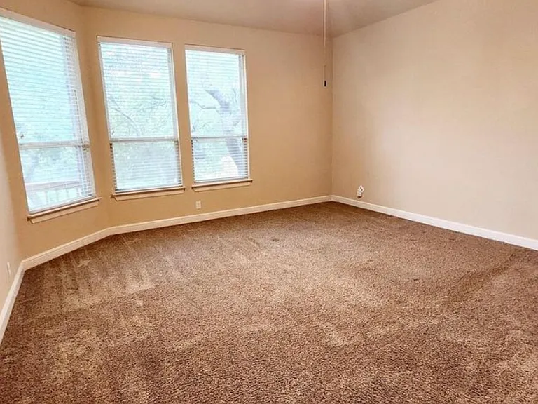 Master bedroom with morning sunlight