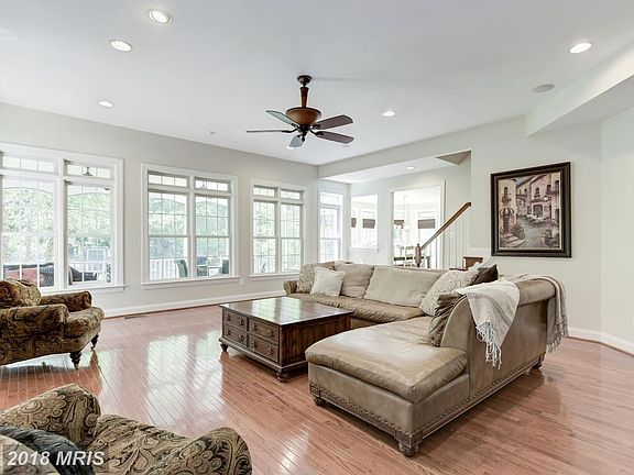 Walks out to Deck/ Patio/ Screened Porch.