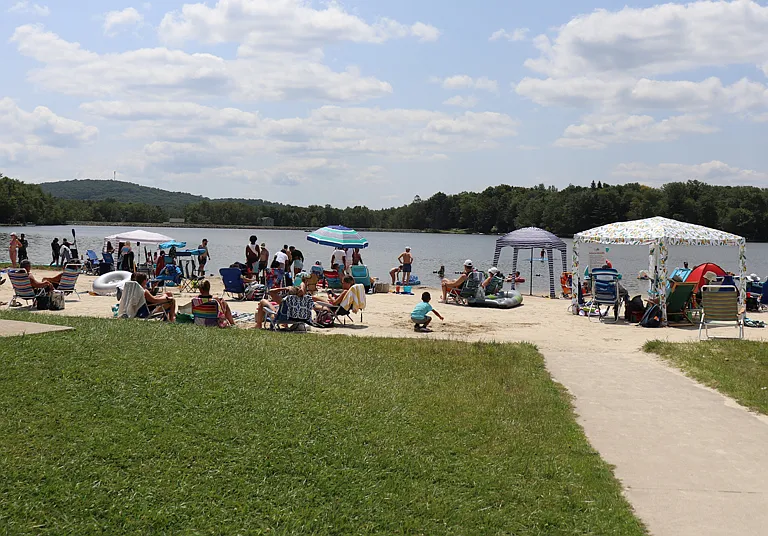 Arrowhead Lake Beach Access _ Enjoy easy access to Arrowhead Lake's beautiful sandy beach areas, perfect for swimming, sunbathing, picnicking, or simply relaxing by the water and taking in the scenic surroundings.
