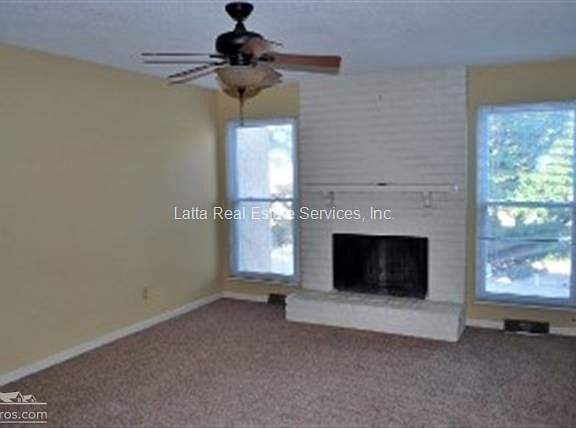Living Room w/wood-burning fireplace