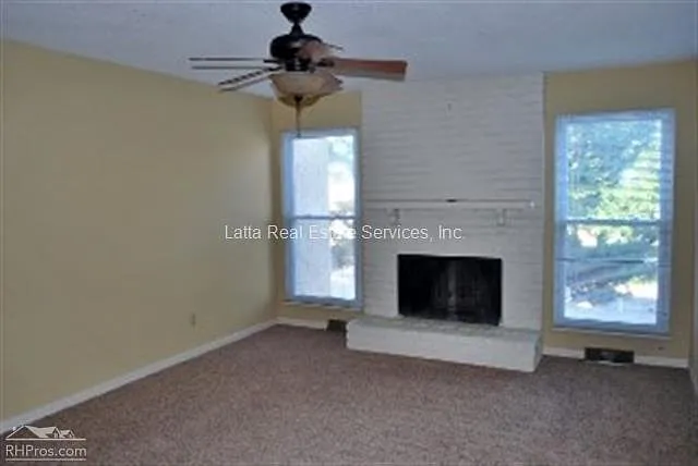 Living Room w/wood-burning fireplace