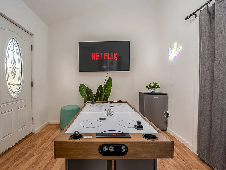 The 2nd living room a.k.a. game room for enjoying movie nights or diving into a gaming session.