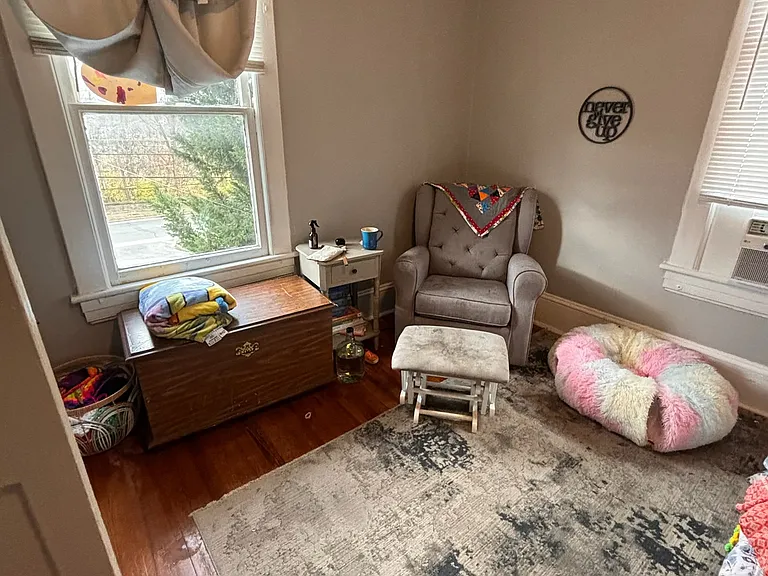 Large Main Bedroom w/ Two Large Windows for Natural Lighting. New Sherwin Williams Designer French Gray Paint. New 52" Ceiling Fan. Original Hardwood Floors.