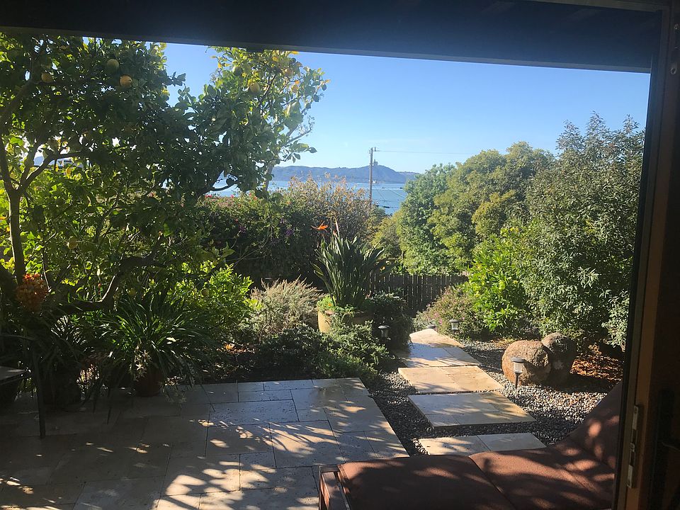 Garden terrace in front of apartment.