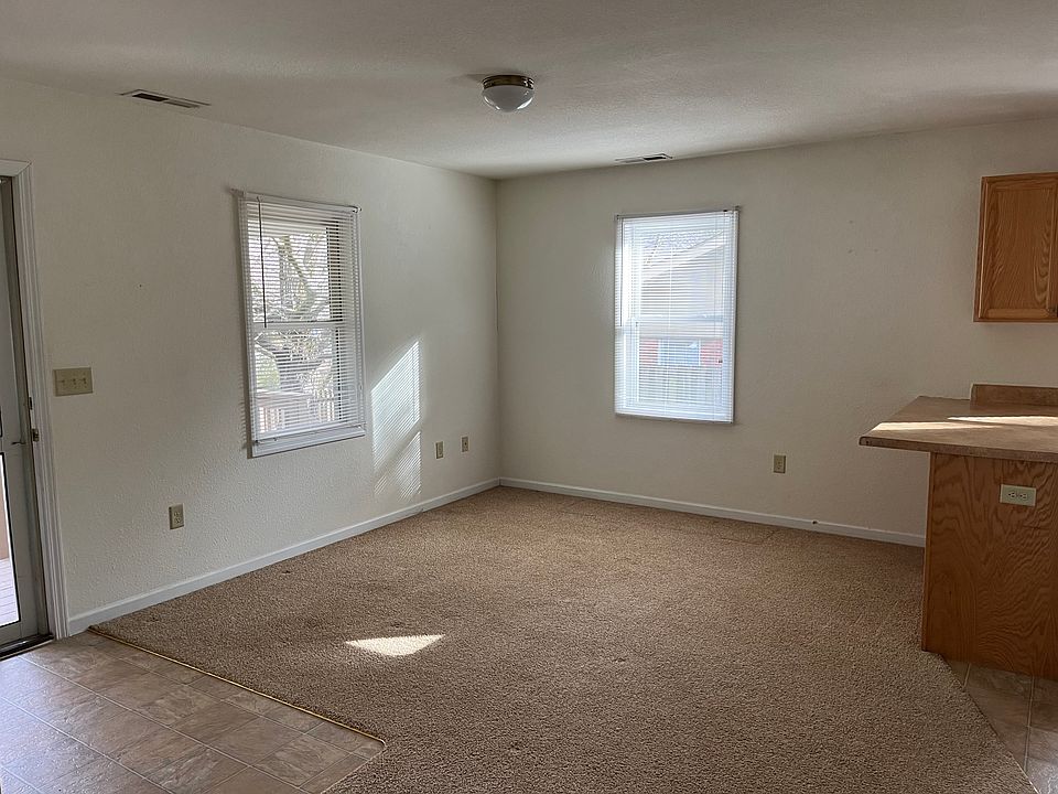 Lots of light with three windows in open living area