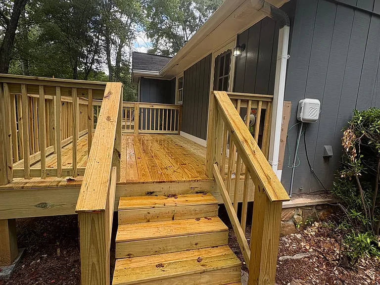 New wooden deck to Mud Room/Laundry Entrance