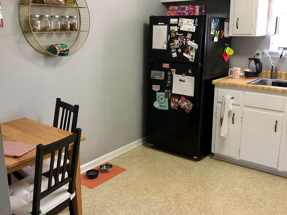 One view of part of the kitchen with eat in area