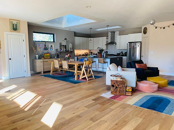dining, kitchen and livingroom view in great room
