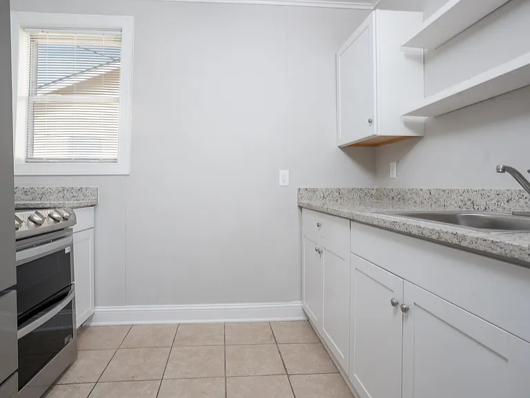 kitchen with granite counters and stainless steel appliances