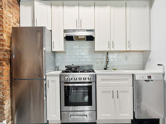 5th image of 431 W 22nd St APT 2F