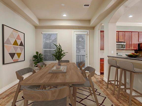 Large dining area with great second story deck off the dining/kitchen area. Perfect place to grill and chill on nice evenings.