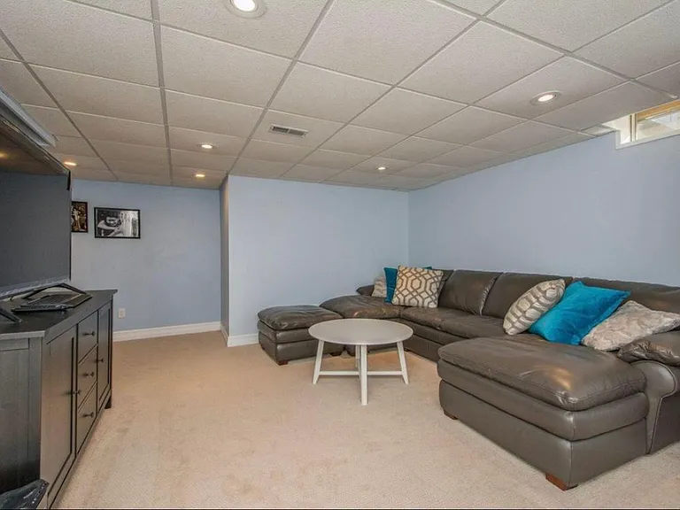 Basement with dimmable lights for entertainment