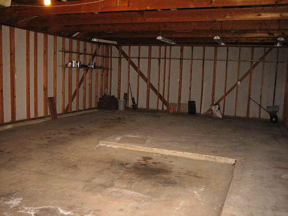 3 car garage w/ work area