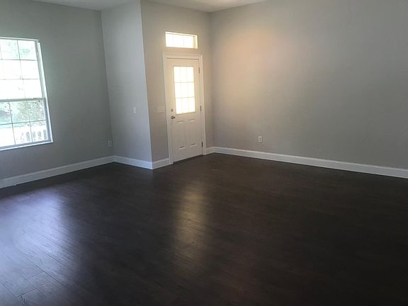 front door, foyer and formal living area