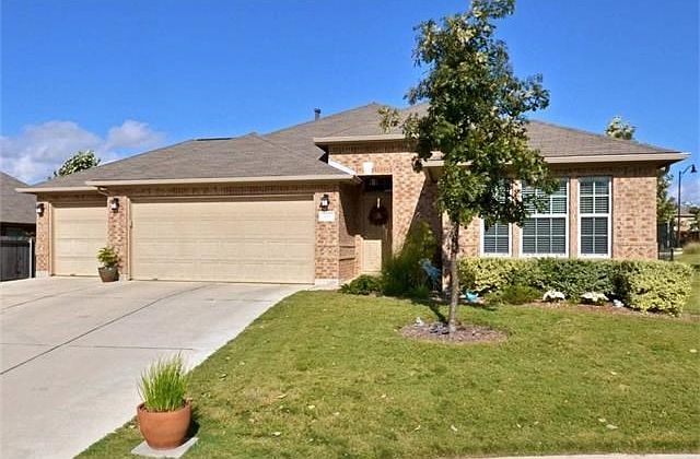 This home was built in Year 2011 and has all brick exterior walls, composition roof, on 60 foot wide lot, three car garage, only one neighbor on left side, community street on backside and greenbelt on right side.