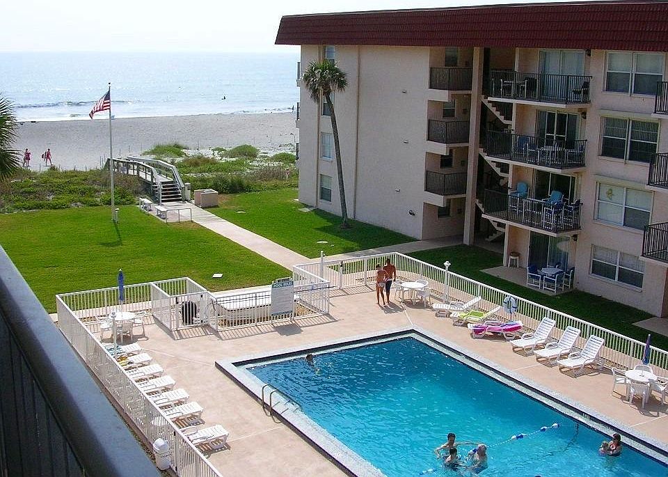 The pool taken from our patio 4th floor. Direct access to beach. Heated. Open all year. U shaped complex.