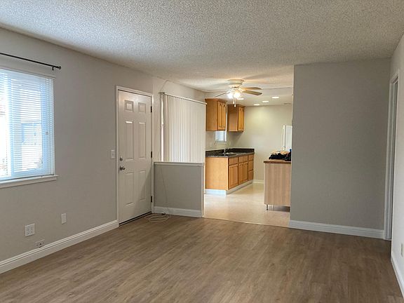 Living Room looking into Kitchen and eating area