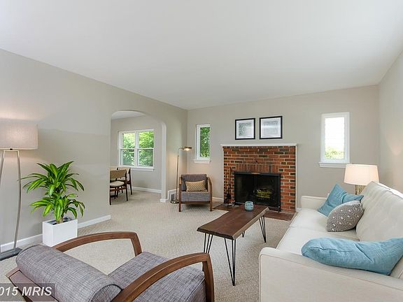 Living Room w/ wood burning fireplace