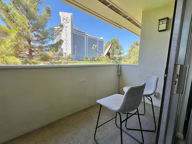 Balcony with a view of the Strip and golf course
