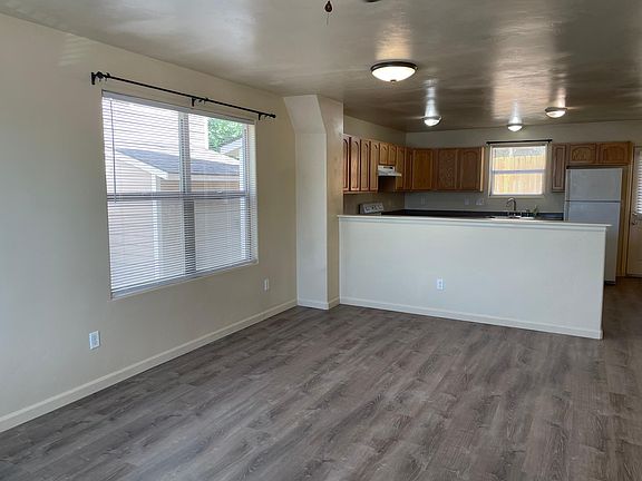Spacious open concept living room/dining area/kitchen.

Updated flooring and recently painted and well maintained.