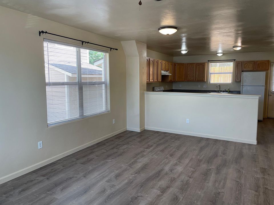Spacious open concept living room/dining area/kitchen.

Updated flooring and recently painted and well maintained.
