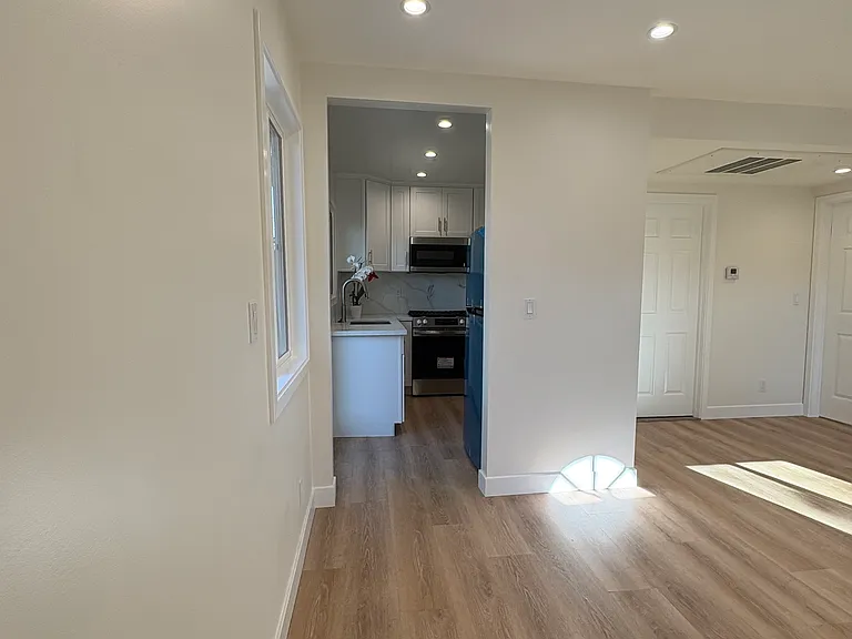 Living Room Entrance with Kitchen, Bathroom and Bedroom door