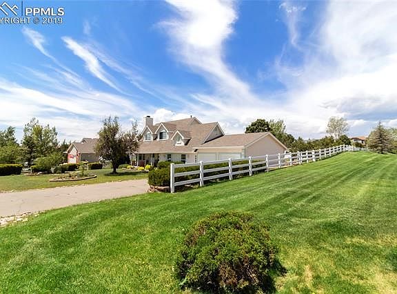 Over a 1/2 acre on a Private Corner lot and over 14 tress!