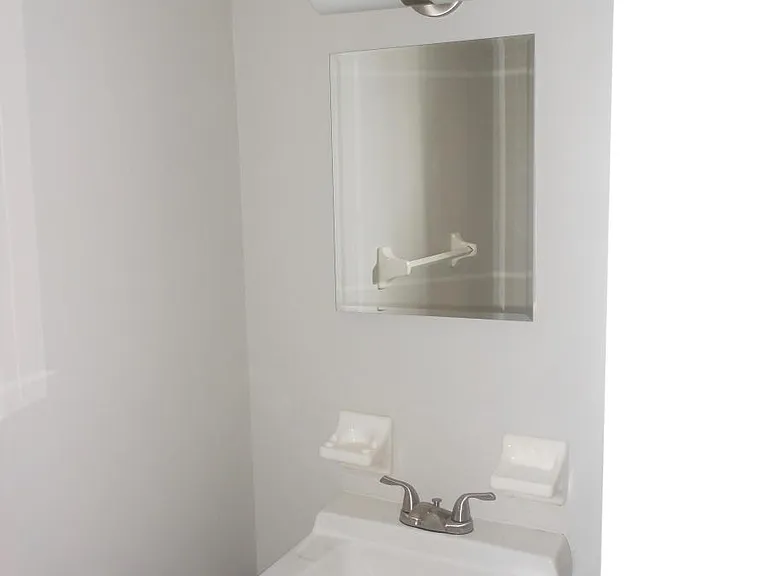 Half bath off downstairs hall