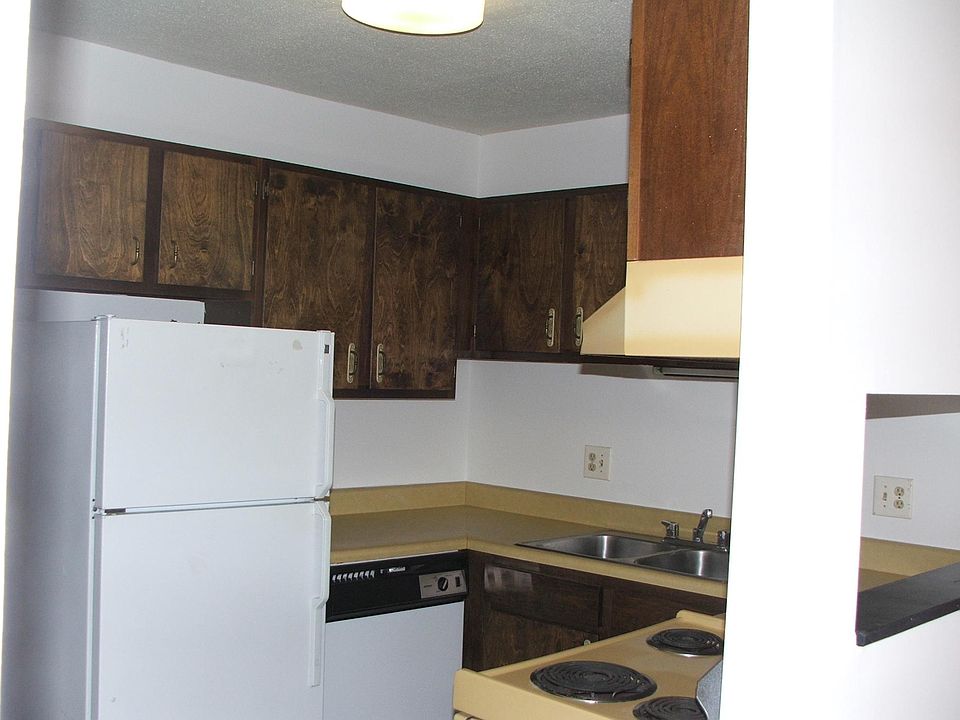 Kitchen with pass-through window to Dining area