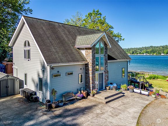 A spacious home on accessible waterfront is difficult to find. This solidly built 2007 home has a second kitchen on the lower level with a private entrance, which provides an opportunity for generational living. The 157 feet of private beach is ideal for kayaking, clamming, or beachcombing.>