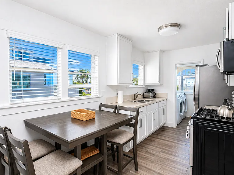 Bright kitchen and dining area with natural light