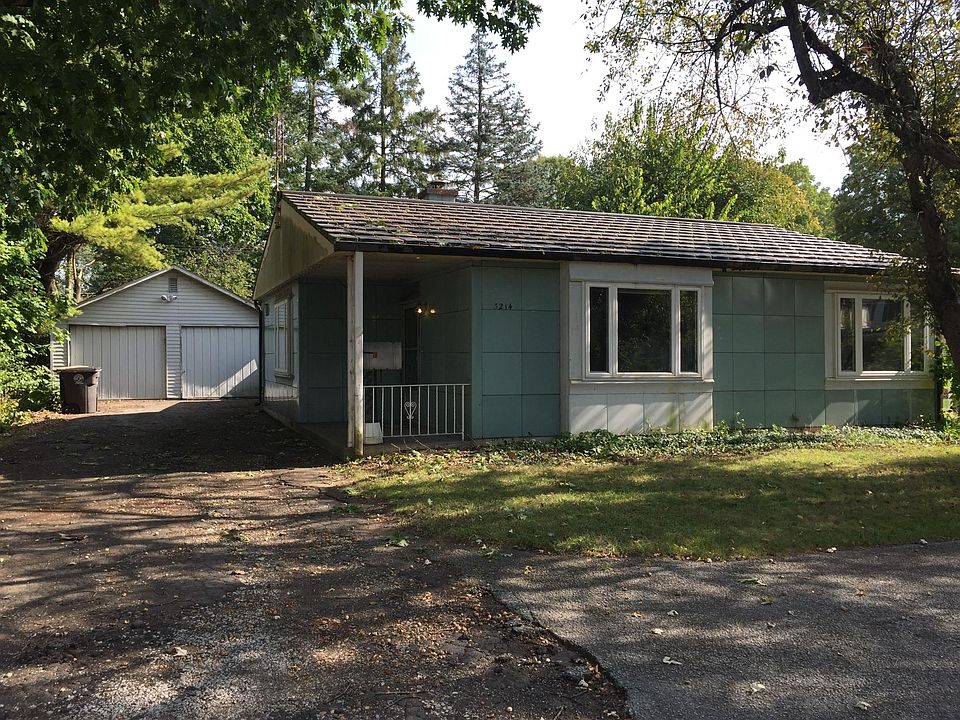front of house driveway on left