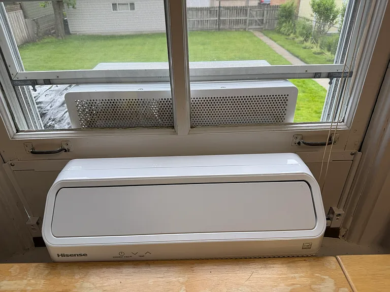 Kitchen window AC unit.