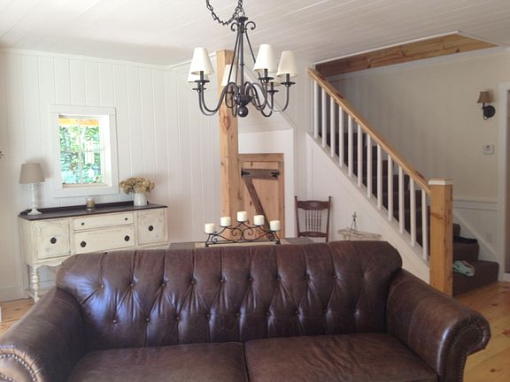 living room w/ stairs to rec