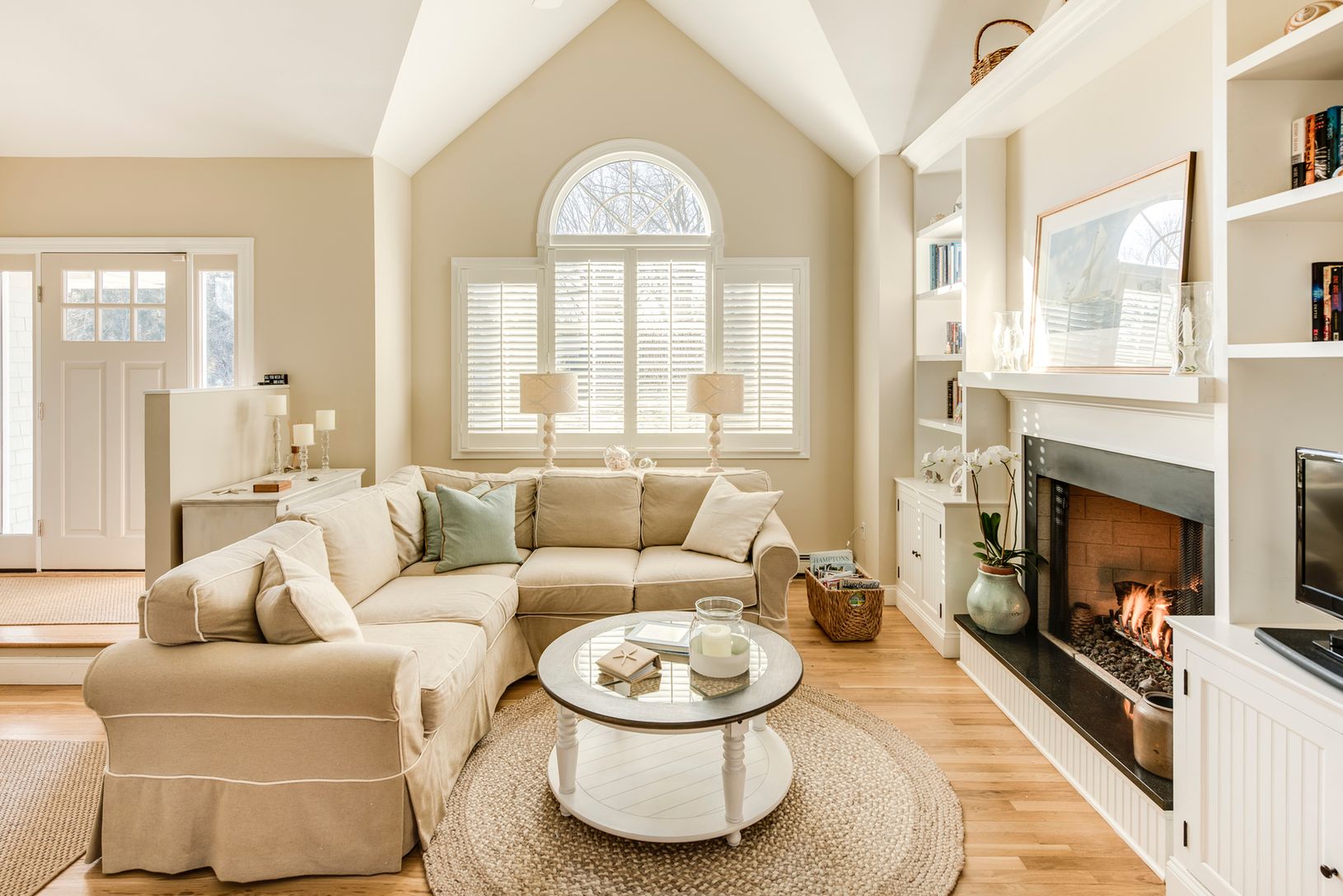  Living room with sectional, flat screen tv and gas fireplace 