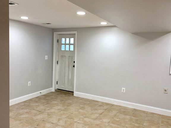 Living room! Update: the door has since been painted ... squash blossom (thank Behr for the fun name).