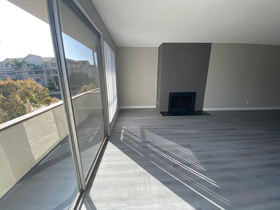 11858 Goshen Ave Unit 207 living room with fireplace and view